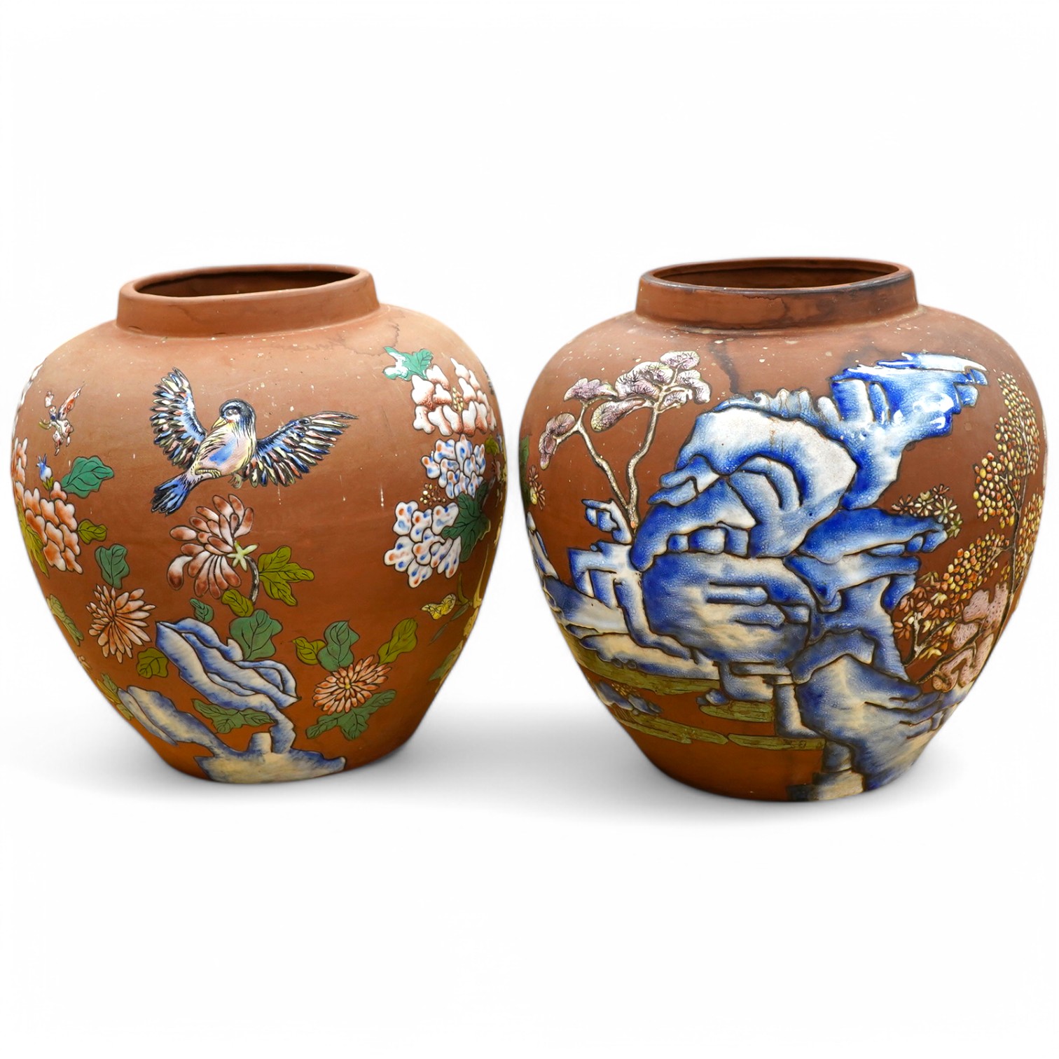 A pair of Japanese enamelled terracotta jars, c.1900, 26cm high. Condition - fair to good